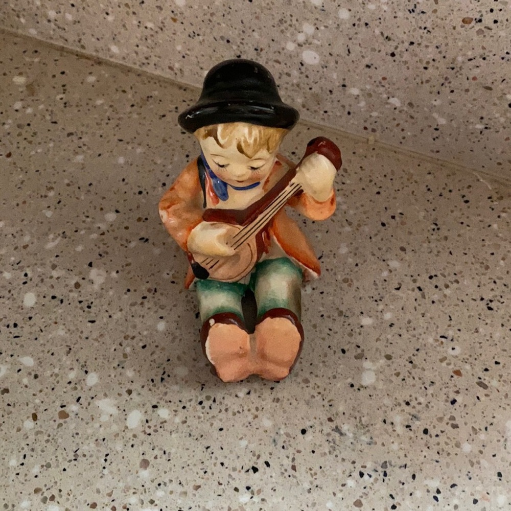 Vintage boy playing Banjo figurine